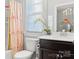 Bathroom with shower/tub combo and peach curtain at 680 Chase Ct, Fort Mill, SC 29708