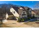 Two-story home with a three car garage and a basketball court at 680 Chase Ct, Fort Mill, SC 29708