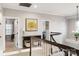 Upstairs hallway with a modern light fixture and access to bedrooms at 680 Chase Ct, Fort Mill, SC 29708