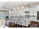 Modern kitchen with white cabinets, granite countertops and island at 680 Chase Ct, Fort Mill, SC 29708