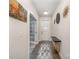 Bright and airy entryway with modern console table and rug at 7067 Waterwheel Sw St, Concord, NC 28025