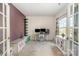 Home office with built-in shelving and French doors at 7067 Waterwheel Sw St, Concord, NC 28025