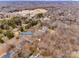 Aerial view showcasing the home's location in a residential neighborhood at 7137 Windyrush Rd, Charlotte, NC 28226