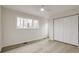 Spacious bedroom with a large window and double door closet at 7137 Windyrush Rd, Charlotte, NC 28226