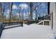 Spacious deck with black railings, overlooking wooded area at 7137 Windyrush Rd, Charlotte, NC 28226