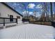 Large deck offering scenic views of backyard at 7137 Windyrush Rd, Charlotte, NC 28226