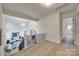 Bright hallway with a view of the living area below at 7137 Windyrush Rd, Charlotte, NC 28226