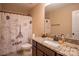 Bathroom with granite vanity and Parisian shower curtain at 7236 Albemarle Dr, Denver, NC 28037