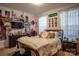 Bedroom with double bed, pink walls, and horse-themed decor at 7236 Albemarle Dr, Denver, NC 28037