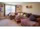 L-shaped sectional sofa dominates this bonus room, creating a cozy atmosphere at 7236 Albemarle Dr, Denver, NC 28037