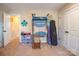 Playroom features a basketball hoop, storage, and a small chair at 7236 Albemarle Dr, Denver, NC 28037