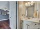 Small bathroom with vanity, sink, and linen at 7251 Meeting St, Charlotte, NC 28210