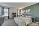 Spacious main bedroom with a work station and large bed at 7251 Meeting St, Charlotte, NC 28210