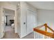 Upper-level hallway with access to bedrooms and closets at 7251 Meeting St, Charlotte, NC 28210