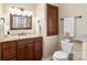 Bathroom showcasing a vanity with granite countertop, updated fixtures, and linen closet at 761 Summerwood Dr, Rock Hill, SC 29732