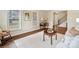 Living room with natural light and neutral color scheme; features hardwood floors and a large window at 761 Summerwood Dr, Rock Hill, SC 29732