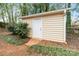 Detached storage shed offers ample space for tools and equipment, set in a tranquil backyard setting at 761 Summerwood Dr, Rock Hill, SC 29732