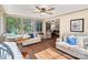 Bright sunroom featuring large windows, an eating area, and comfortable seating at 761 Summerwood Dr, Rock Hill, SC 29732