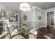 Bright dining area with glass table and four chairs at 7908 Rea View Ct, Charlotte, NC 28226