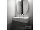 Modern powder room with round mirror and floating vanity at 7908 Rea View Ct, Charlotte, NC 28226