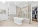 Elegant bathroom with freestanding tub, walk-in shower, and separate closet at 832 Heather Ln, Charlotte, NC 28209