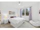 Bright bedroom with a queen-size bed, and ample natural light at 832 Heather Ln, Charlotte, NC 28209