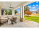 Spacious front porch with seating area overlooking the street at 832 Heather Ln, Charlotte, NC 28209