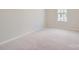 Spacious bedroom featuring neutral walls and carpet at 9839 Old Garden Cir, Gastonia, NC 28056