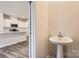 Convenient powder room near kitchen entry at 9839 Old Garden Cir, Gastonia, NC 28056