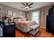 Well-lit bedroom with hardwood floors and a ceiling fan at 116 Country Creek Dr, Kings Mountain, NC 28086