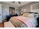 Comfortable bedroom with hardwood floors and a ceiling fan at 116 Country Creek Dr, Kings Mountain, NC 28086