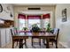 Charming breakfast nook with a wood table and bay window at 116 Country Creek Dr, Kings Mountain, NC 28086