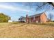 Brick house with screened porch and deck at 116 Country Creek Dr, Kings Mountain, NC 28086