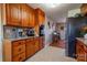 Kitchen boasts wood cabinets, granite countertops, and stainless steel appliances at 116 Country Creek Dr, Kings Mountain, NC 28086