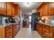 Kitchen with wood cabinets, granite countertops, and stainless steel appliances at 116 Country Creek Dr, Kings Mountain, NC 28086