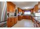 Spacious kitchen with wood cabinets, granite counters, and stainless steel appliances at 116 Country Creek Dr, Kings Mountain, NC 28086