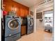 Laundry room with washer, dryer, and ample storage at 116 Country Creek Dr, Kings Mountain, NC 28086