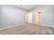 Spacious bedroom with neutral walls and carpet, plus en-suite bathroom at 123 Neill Estate Ln, Mooresville, NC 28117