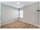 Bright bedroom featuring a window and carpet at 123 Neill Estate Ln, Mooresville, NC 28117