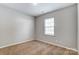 Simple bedroom with neutral walls and carpet at 123 Neill Estate Ln, Mooresville, NC 28117