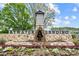 Attractive community entrance with water feature and landscaping at 123 Neill Estate Ln, Mooresville, NC 28117