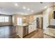 Modern kitchen with stainless steel appliances and granite countertops at 123 Neill Estate Ln, Mooresville, NC 28117