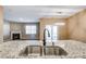 Granite countertop kitchen island with a modern sink and faucet at 123 Neill Estate Ln, Mooresville, NC 28117