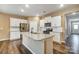 White cabinets, granite countertops, and stainless steel appliances at 123 Neill Estate Ln, Mooresville, NC 28117