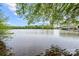 Serene lake view with bridge and lush greenery at 123 Neill Estate Ln, Mooresville, NC 28117