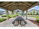 Covered picnic area with a large table and benches at 123 Neill Estate Ln, Mooresville, NC 28117