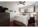 Comfortable bedroom with a king-size bed, dresser, and hardwood floors at 1315 East Blvd # 420, Charlotte, NC 28203