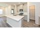 Modern kitchen with gray cabinets, white countertops, and a large pantry at 135 Aberdeen Dr, Salisbury, NC 28144