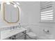 Elegant bathroom with marble vanity, updated fixtures, and stylish mirror at 13505 Evening Primrose Dr, Davidson, NC 28036