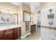 Large bathroom with double vanity and a walk-in shower at 13924 Island Dr, Huntersville, NC 28078